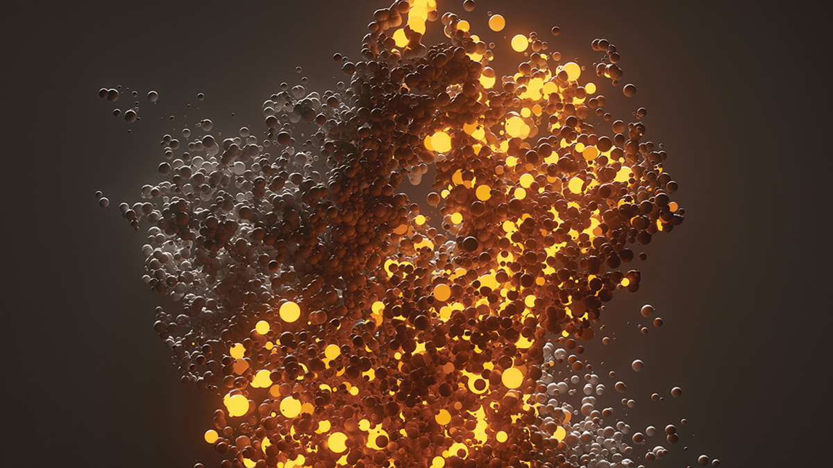 A close-up image of numerous small, glowing particles or bubbles, with a mixture of bright yellow and dark brown colors, creating a dynamic and abstract visual effect against a dark background.