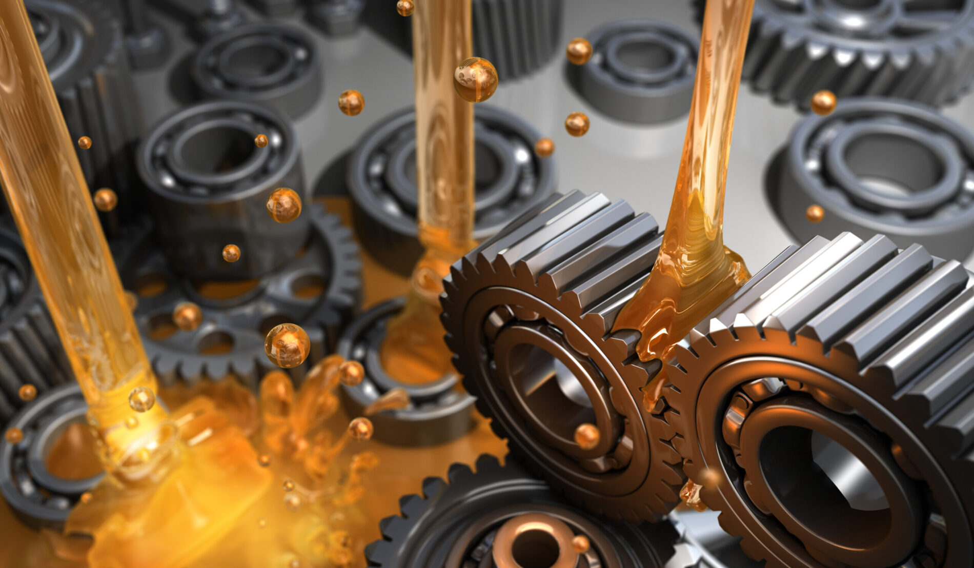 Close-up of metallic gears with oil pouring over them, creating a splash and droplets suspended in midair. The gears are arranged in a complex pattern, and the oil has a shiny, amber appearance, highlighting the mechanical and industrial theme.